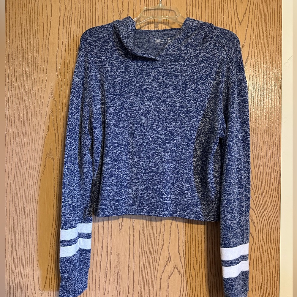 Blue pullover hoodie with white stripes on arms